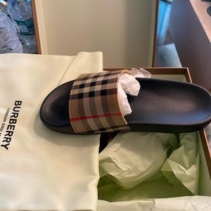 Brand new Burberry slides size 35 which is 3-3.5 us size